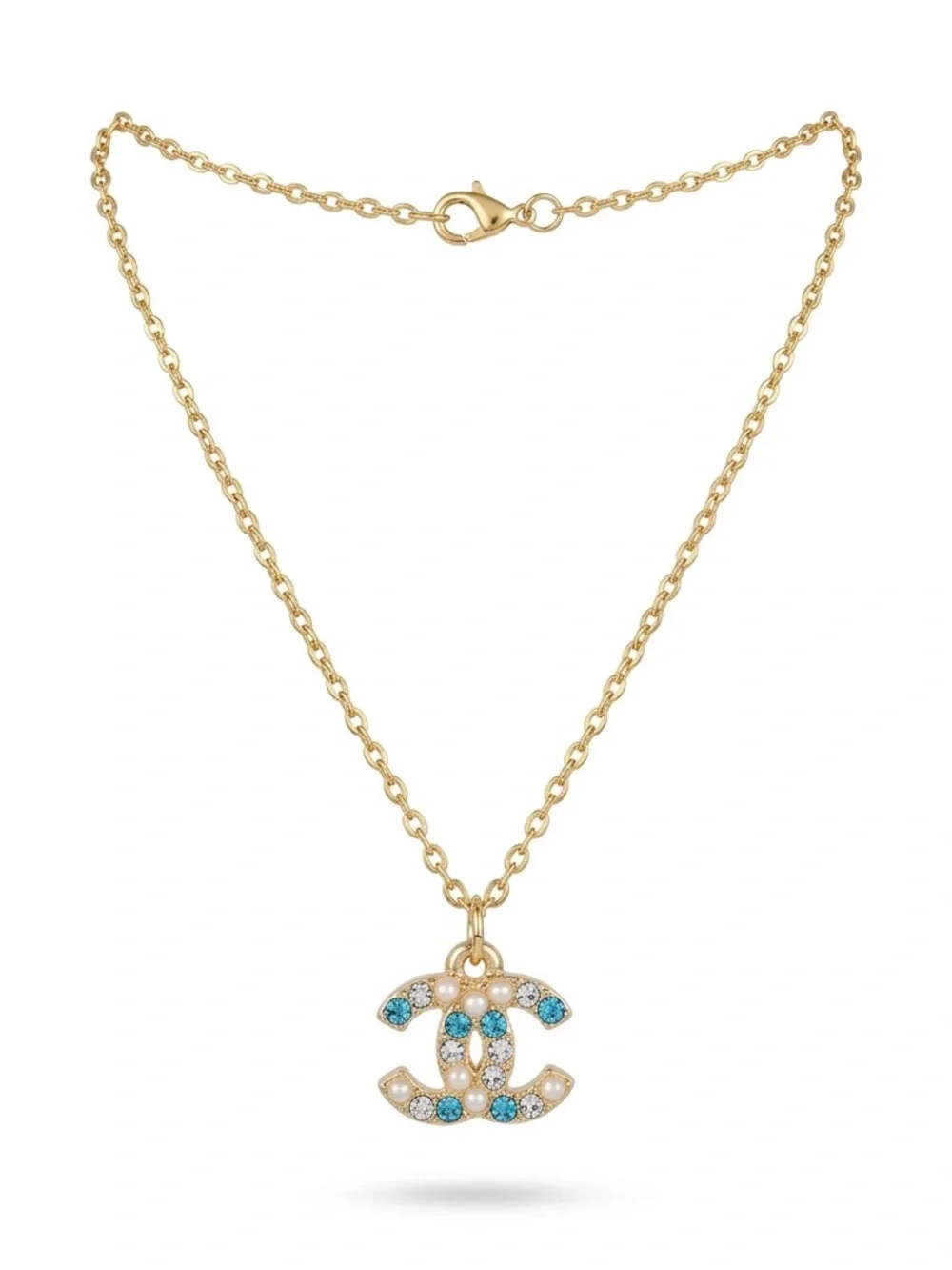Gold Chain Necklace with Blue and Clear Gemstone Pendant